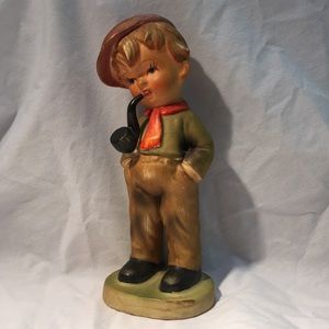 Figurine with a pipe